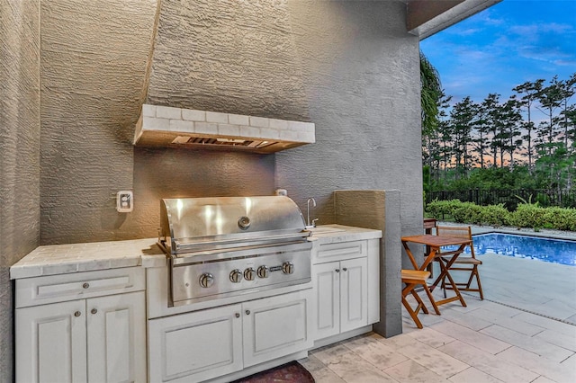 6294 W Fallsgrove Ln, Port Orange, FL 32128 - view of patio / terrace featuring an outdoor kitchen and a sink