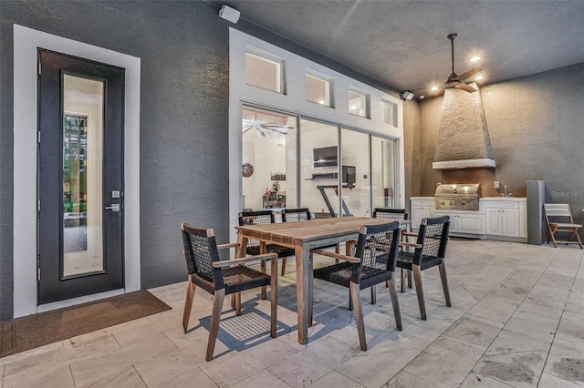 6294 W Fallsgrove Ln, Port Orange, FL 32128 - view of patio with an outdoor kitchen, outdoor dining area, and a ceiling fan