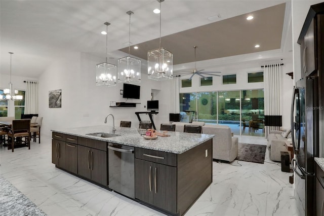 6294 W Fallsgrove Ln, Port Orange, FL 32128 - kitchen featuring stainless steel dishwasher, a chandelier, freestanding refrigerator, open floor plan, and light marble finish flooring