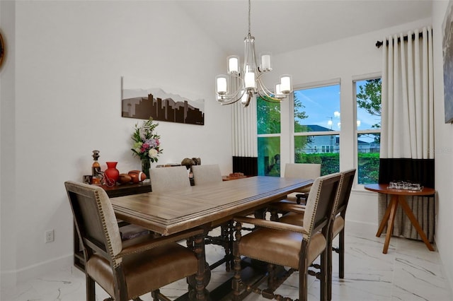 6294 W Fallsgrove Ln, Port Orange, FL 32128 - dining space with light marble finish flooring and a chandelier