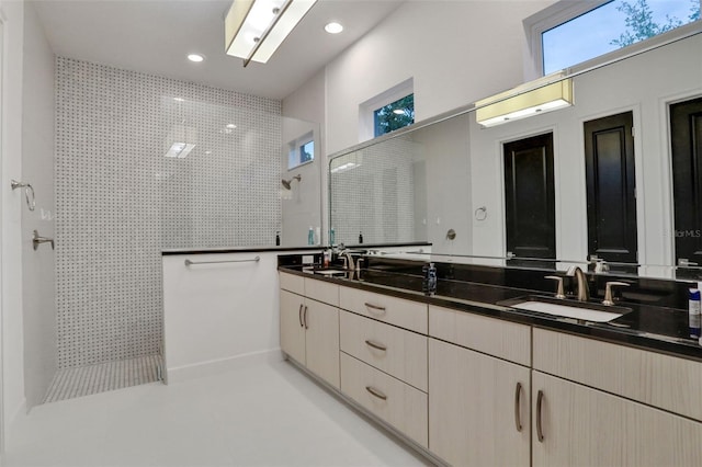 6294 W Fallsgrove Ln, Port Orange, FL 32128 - bathroom featuring walk in shower, double vanity, and recessed lighting