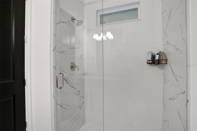 6294 W Fallsgrove Ln, Port Orange, FL 32128 - bathroom featuring a marble finish shower