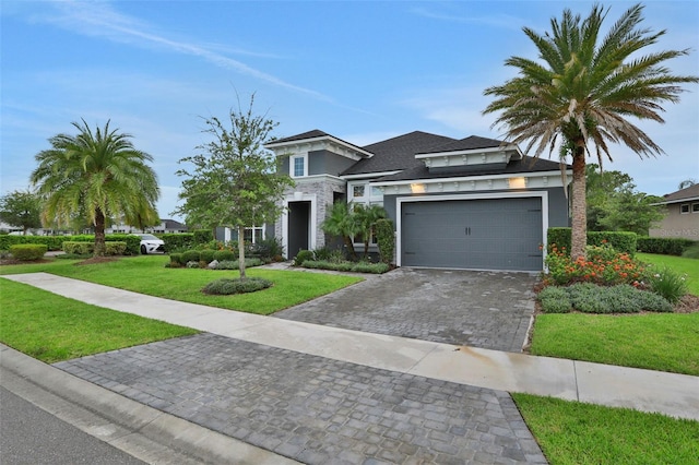 6294 W Fallsgrove Ln, Port Orange, FL 32128 - view of front of property featuring a front lawn, decorative driveway, and stucco siding