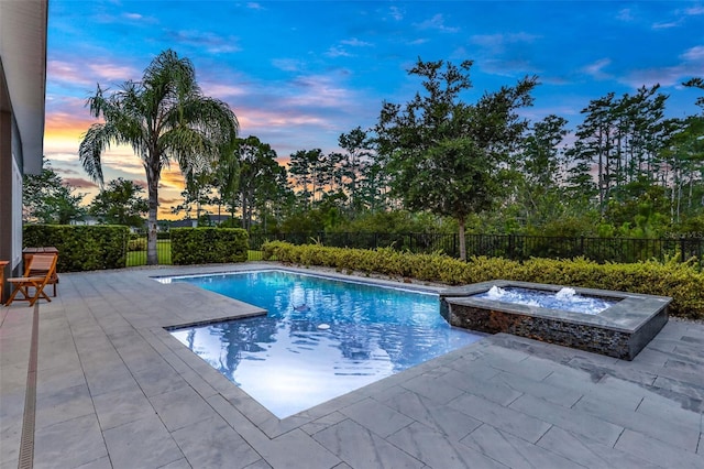 6294 W Fallsgrove Ln, Port Orange, FL 32128 - view of pool with a patio, a fenced backyard, and a pool with connected hot tub