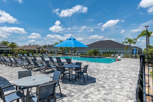 6294 W Fallsgrove Ln, Port Orange, FL 32128 - community pool with a patio