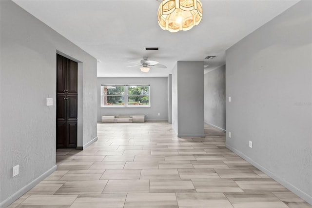 800 Black Duck Dr, Port Orange, FL 32127 - empty room with ceiling fan and a chandelier