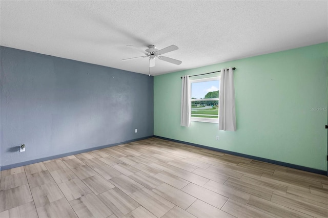 800 Black Duck Dr, Port Orange, FL 32127 - empty room with ceiling fan, a textured ceiling, and wood finished floors