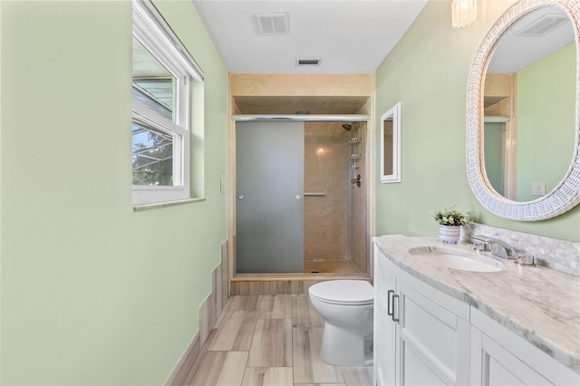 800 Black Duck Dr, Port Orange, FL 32127 - full bath featuring vanity, a stall shower, and wood finished floors