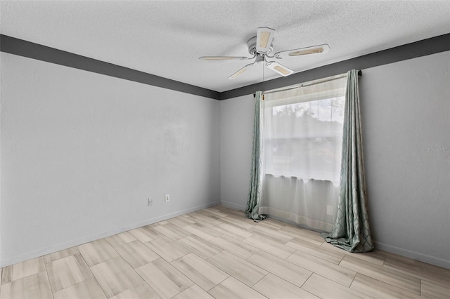 800 Black Duck Dr, Port Orange, FL 32127 - spare room with ceiling fan, a textured ceiling, and wood finished floors
