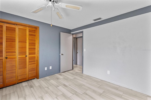800 Black Duck Dr, Port Orange, FL 32127 - unfurnished bedroom featuring a closet and ceiling fan