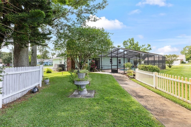 800 Black Duck Dr, Port Orange, FL 32127 - fenced yard with a swimming pool and glass enclosure