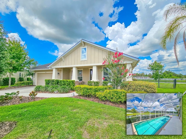 6804 Forkmead Ln, Port Orange, FL 32128 - view of front of home with board and batten siding, a garage, concrete driveway, and a porch