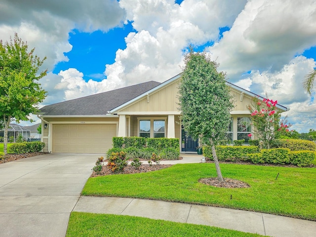 6804 Forkmead Ln, Port Orange, FL 32128 - view of front of property featuring a garage, driveway, a front lawn, and board and batten siding