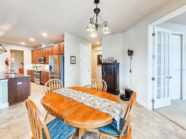 6804 Forkmead Ln, Port Orange, FL 32128 - dining space featuring recessed lighting and light tile patterned floors