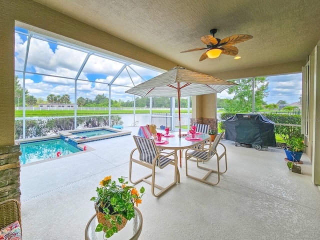 6804 Forkmead Ln, Port Orange, FL 32128 - view of patio with area for grilling, a water view, a lanai, ceiling fan, and a pool with connected hot tub
