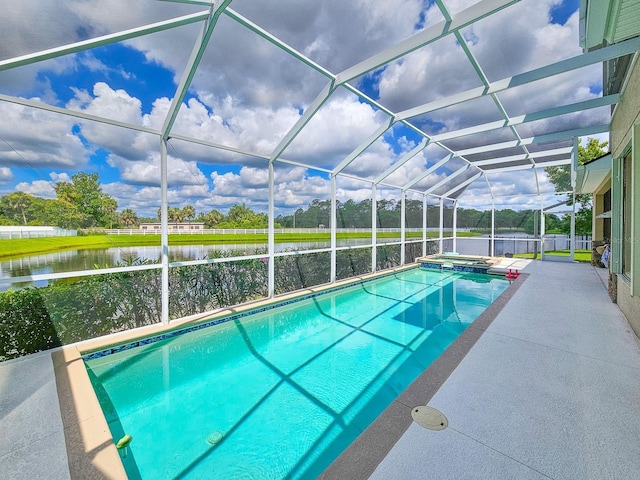 6804 Forkmead Ln, Port Orange, FL 32128 - view of swimming pool with a water view, a patio area, a pool with connected hot tub, and a lanai
