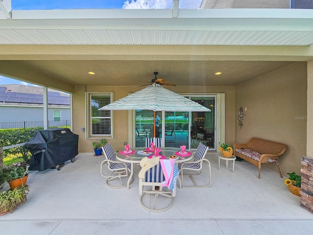 6804 Forkmead Ln, Port Orange, FL 32128 - view of patio with a ceiling fan and area for grilling