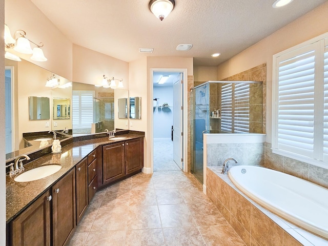 6804 Forkmead Ln, Port Orange, FL 32128 - full bath with a shower stall, a garden tub, and double vanity