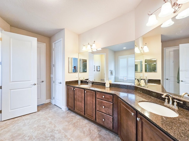 6804 Forkmead Ln, Port Orange, FL 32128 - bathroom featuring double vanity, a chandelier, and tile patterned flooring