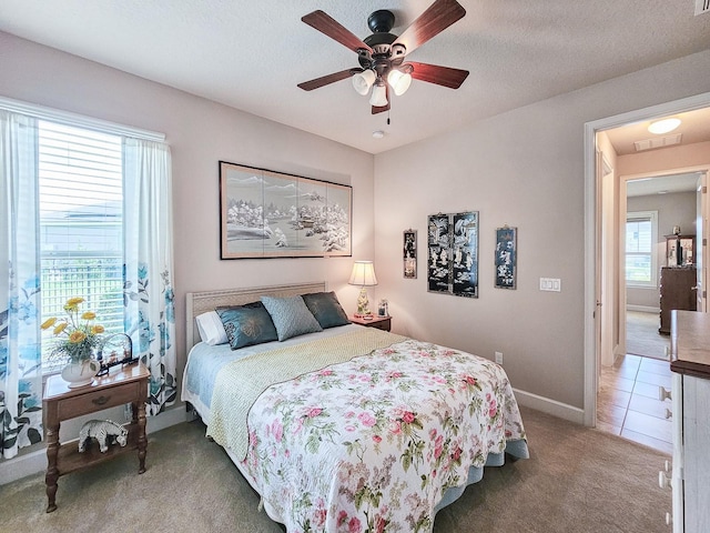 6804 Forkmead Ln, Port Orange, FL 32128 - bedroom featuring light colored carpet and ceiling fan