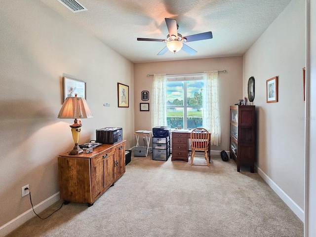 6804 Forkmead Ln, Port Orange, FL 32128 - office space with a ceiling fan, light colored carpet, and a textured ceiling