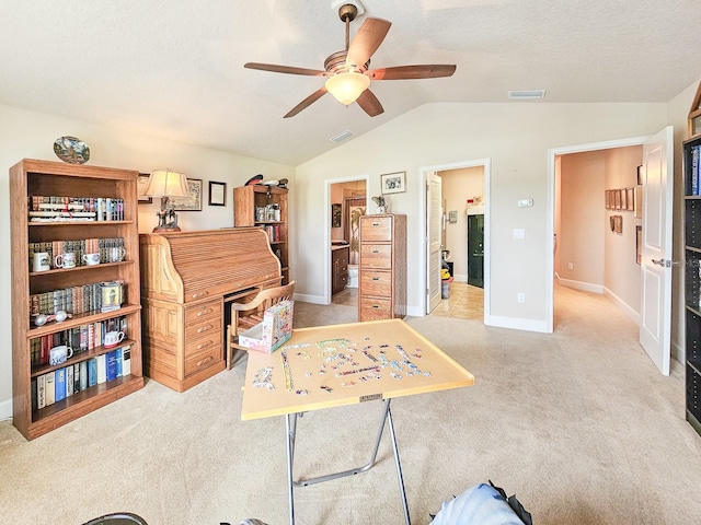 6804 Forkmead Ln, Port Orange, FL 32128 - home office featuring ceiling fan, light carpet, and vaulted ceiling