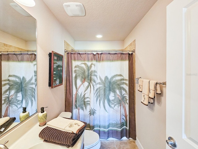 6804 Forkmead Ln, Port Orange, FL 32128 - full bathroom featuring a textured ceiling, a shower with curtain, tile patterned flooring, and vanity