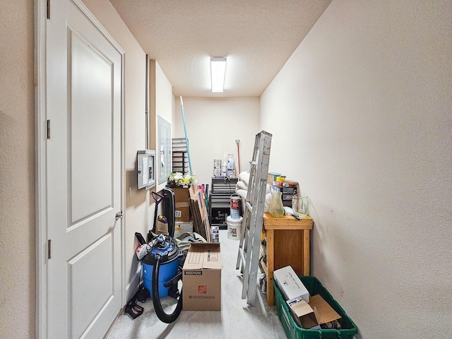 6804 Forkmead Ln, Port Orange, FL 32128 - misc room with carpet floors, a textured ceiling, and a textured wall