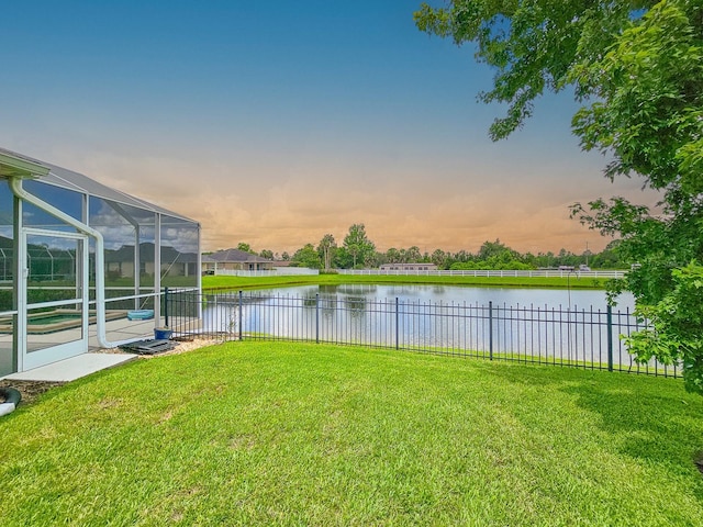 6804 Forkmead Ln, Port Orange, FL 32128 - view of yard featuring a water view and glass enclosure
