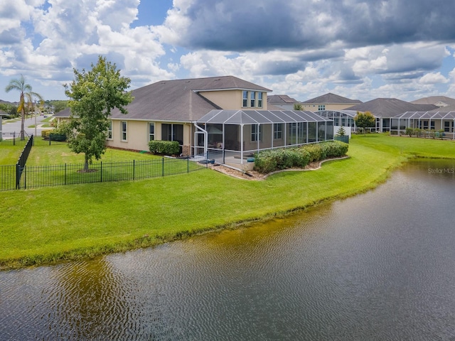 6804 Forkmead Ln, Port Orange, FL 32128 - back of property with a water view, a fenced backyard, glass enclosure, stucco siding, and a shingled roof