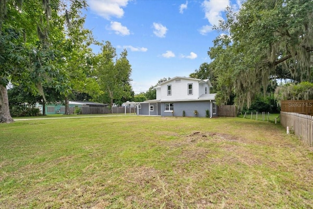 2005 Sunny Ln, New Smyrna Beach, FL 32168 - view of fenced backyard