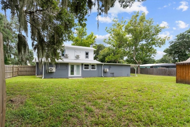 2005 Sunny Ln, New Smyrna Beach, FL 32168 - rear view of property with french doors, a fenced backyard, and a chimney