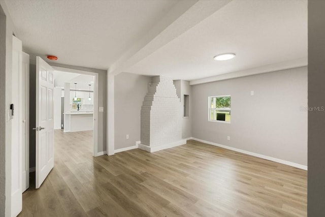 2005 Sunny Ln, New Smyrna Beach, FL 32168 - empty room with light wood-style floors and baseboards