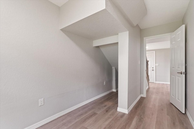 2005 Sunny Ln, New Smyrna Beach, FL 32168 - additional living space with light wood-type flooring and baseboards