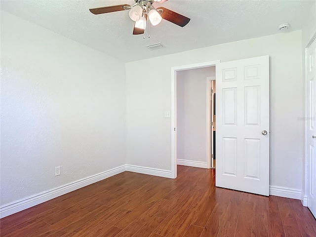 3045 Pine Tree Dr, Edgewater, FL 32141 - unfurnished bedroom featuring wood finished floors and ceiling fan