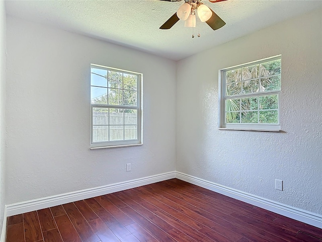 3045 Pine Tree Dr, Edgewater, FL 32141 - unfurnished room featuring wood finished floors, a ceiling fan, and a textured wall