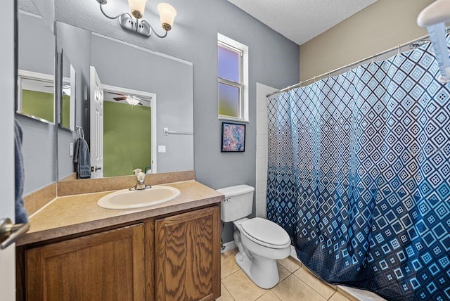 411 Ryans Ridge Ave, Eustis, FL 32726 - full bathroom with tile patterned flooring, vanity, a textured ceiling, a ceiling fan, and curtained shower