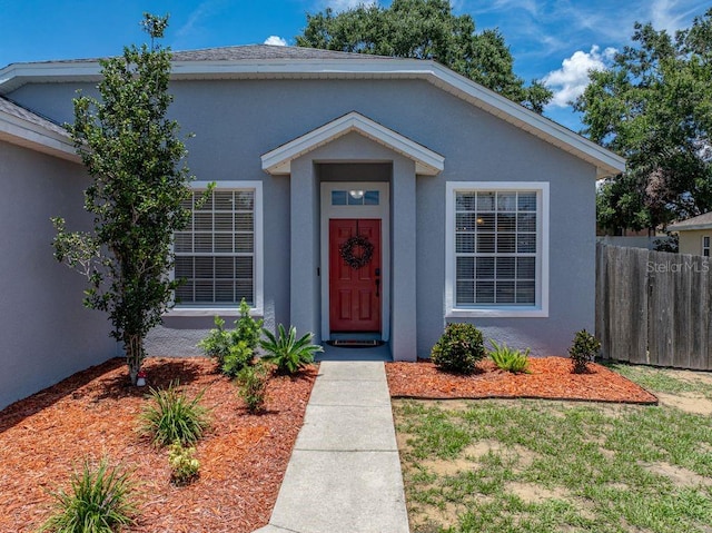 411 Ryans Ridge Ave, Eustis, FL 32726 - view of front of house featuring stucco siding