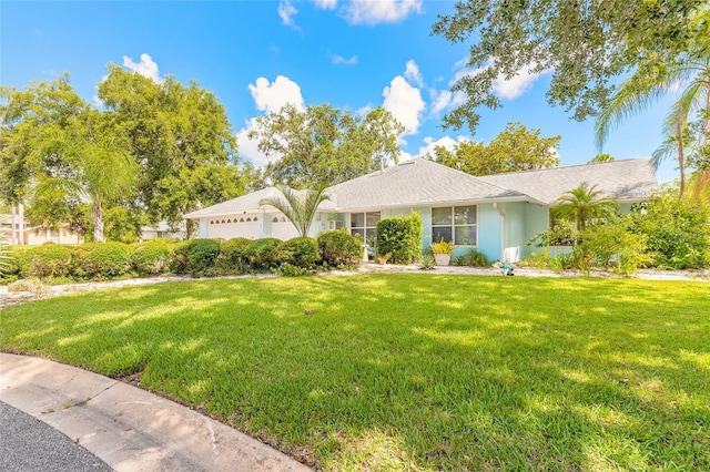 904 Clubhouse Blvd, New Smyrna Beach, FL 32168 - single story home featuring a garage and a front lawn