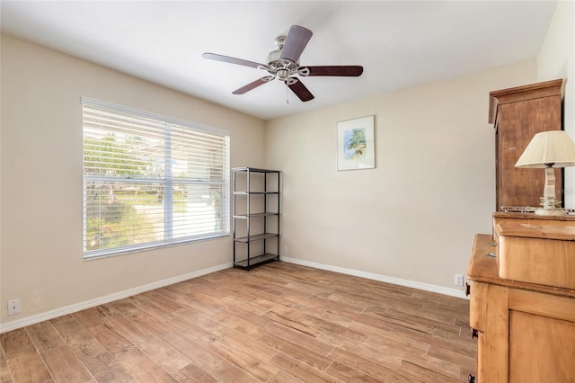 904 Clubhouse Blvd, New Smyrna Beach, FL 32168 - spare room featuring light wood finished floors and ceiling fan