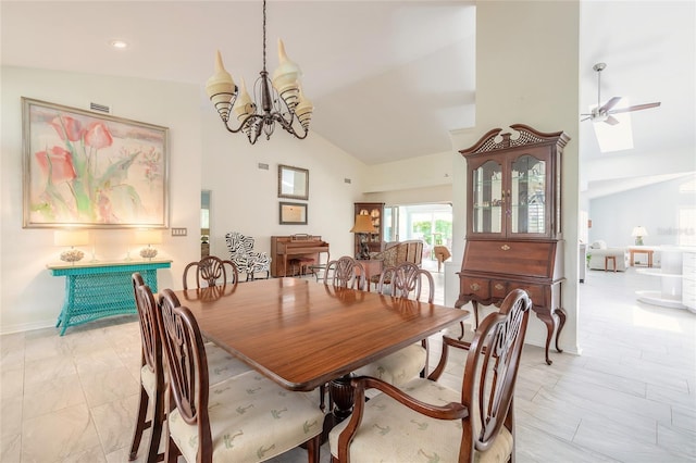 904 Clubhouse Blvd, New Smyrna Beach, FL 32168 - dining room with high vaulted ceiling, ceiling fan, and a chandelier