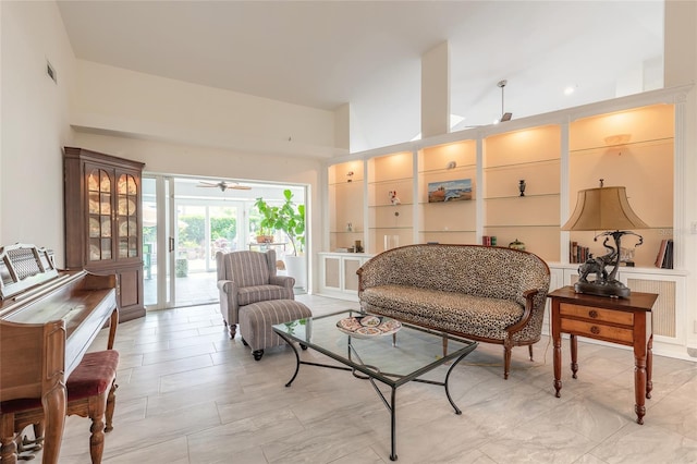 904 Clubhouse Blvd, New Smyrna Beach, FL 32168 - living area featuring ceiling fan and high vaulted ceiling