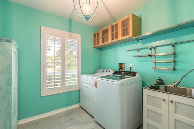 904 Clubhouse Blvd, New Smyrna Beach, FL 32168 - washroom featuring separate washer and dryer and cabinet space