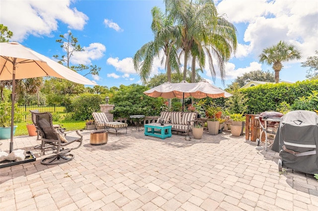 904 Clubhouse Blvd, New Smyrna Beach, FL 32168 - view of patio featuring area for grilling and a fire pit