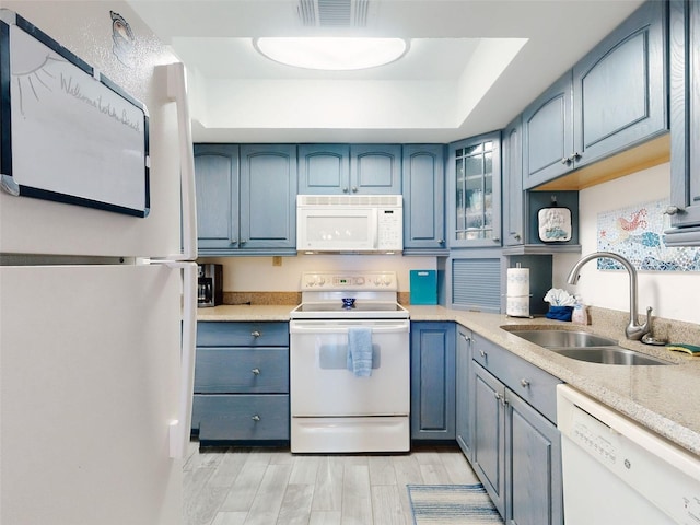 4175 S Atlantic Ave Unit 4110, New Smyrna Beach, FL 32169 - kitchen with white appliances and blue cabinets