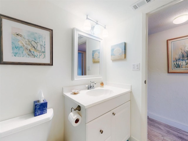 4175 S Atlantic Ave Unit 4110, New Smyrna Beach, FL 32169 - bathroom featuring vanity and wood finished floors