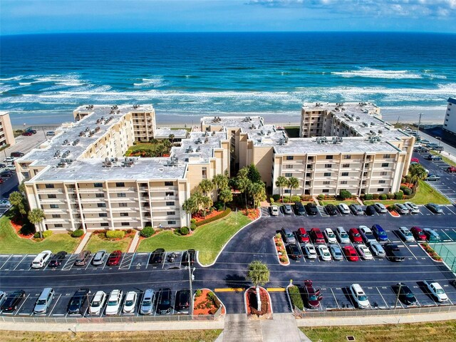 4175 S Atlantic Ave Unit 4110, New Smyrna Beach, FL 32169 - drone / aerial view of apartment complex / building and a nearby body of water