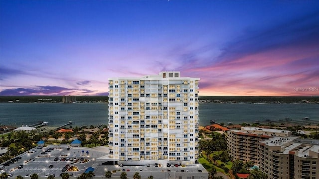 2 Oceans W Blvd Unit 206, Daytona Beach Shores, FL 32118 - property at dusk featuring a water view