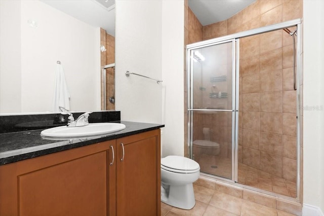 2 Oceans W Blvd Unit 206, Daytona Beach Shores, FL 32118 - bathroom with vanity, a stall shower, and tile patterned flooring