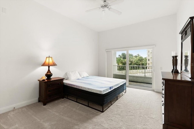 2 Oceans W Blvd Unit 206, Daytona Beach Shores, FL 32118 - bedroom featuring access to exterior, light carpet, and a ceiling fan